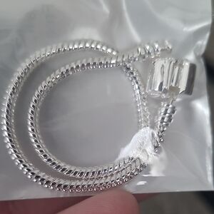 Elegant Silver Bracelet With Charms